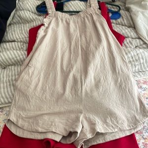 Tan romper size S gently used, smoke free home.
